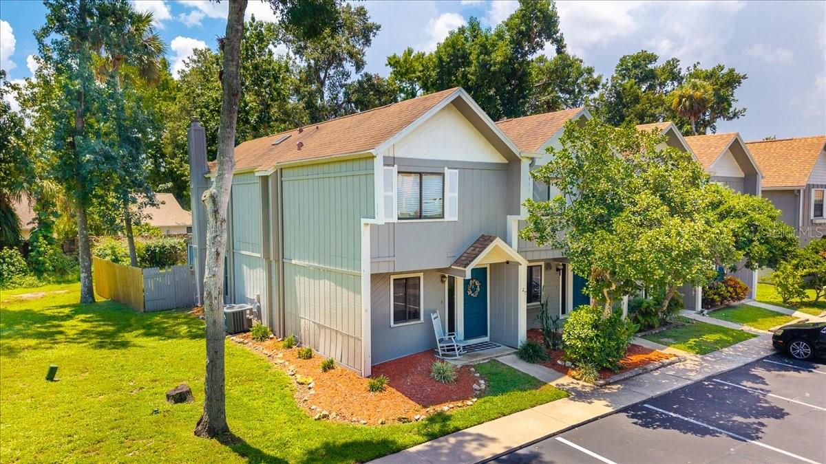 Welcome to Willow Trail Townhomes in Port Orange. This 2-bedroom, 2.5-bath townhouse offers a functional layout and a convenient location within a well-kept community. The first floor features an open living and dining area with sliding glass doors leading to a private screened patio. Upstairs, you'll find two spacious bedrooms, each with its own private bathroom and closet space. The screened patio serves as an extension of the living space. The home includes assigned parking and access to community amenities. Residents enjoy a community pool and tennis court. Pets are welcome. The location of Willow Trail Townhomes adds to its value. Shopping, dining, and top-rated schools are close by, while the beach is only a short drive away. Major roadways provide quick connections to Daytona Beach, Orlando, and beyond. This townhouse combines space, functionality, and community living in Port Orange. Whether you are searching for a primary residence or an investment property, this home is worth your attention.