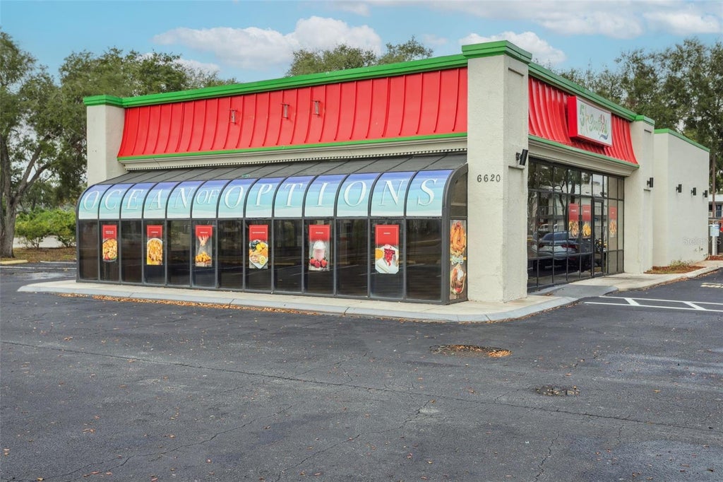 Photo of 6620 E Dr Martin Luther King Jr Boulevard, Tampa, FL 33619 (MLS # TB8548445)