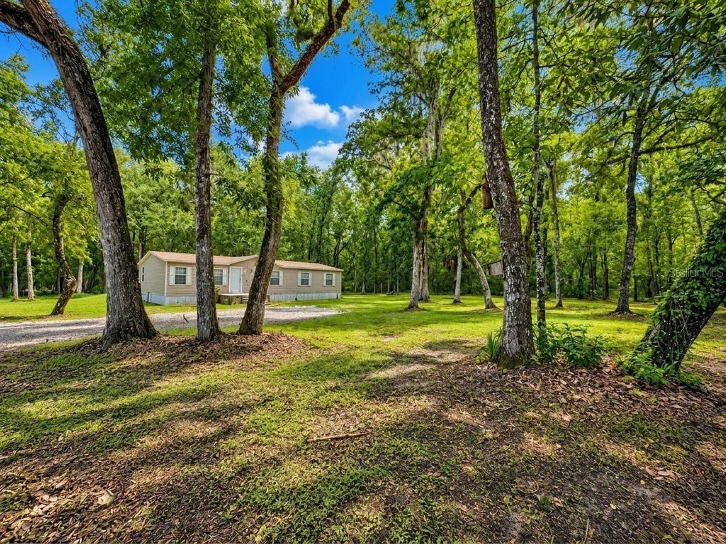 Photo of 13539 Citrus Way, Brooksville, FL 34601 (MLS # TB8540834)