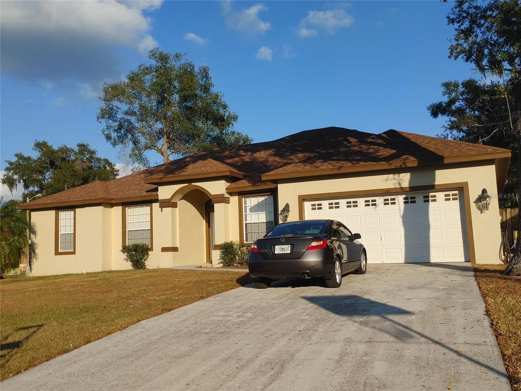 Photo of 5398 Oxford Manor Circle, Lakeland, FL 33810 (MLS # O6363717)