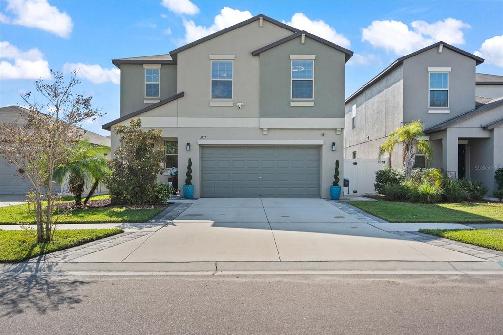 Photo of 3717 Cat Mint Street, Tampa, FL 33619 (MLS # TB8558096)