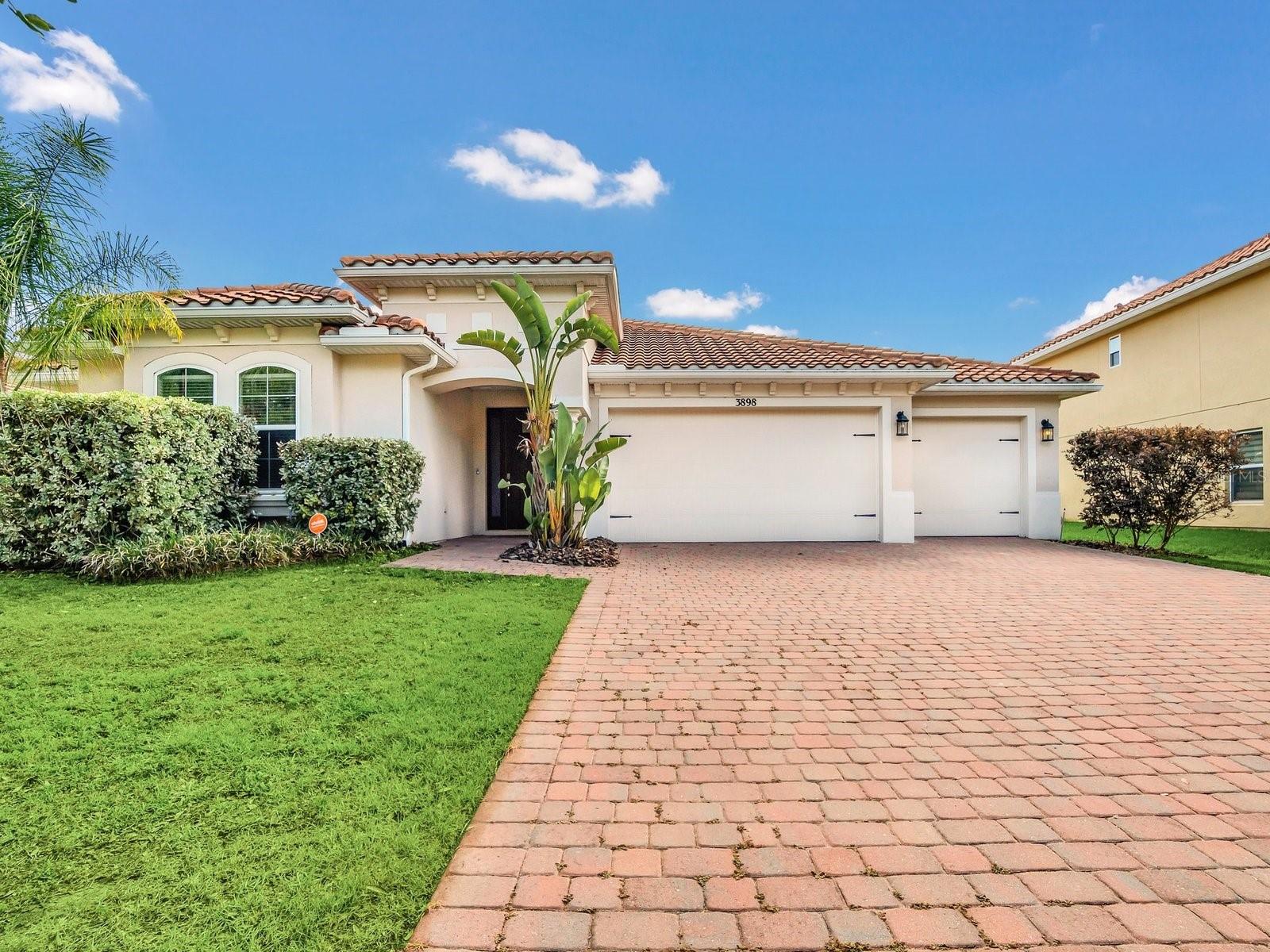 BELLALAGO- Don't Miss this opportunity to own this 4 bedroom / 3 bathrooms and office/loft home. A wide foyer guides you into the ample great room, perfect for entertaining family and friends. The kitchen features GRANITE countertops, double built-in ovens, an ISLAND, and stainless-steel appliances, making it a true focal point of the home. The bedrooms are spacious and ALL feature walk-in closets. A office/loft room with double doors offers endless possibilities for customization as a game room, office, or hobby room. The recessed lighting throughout the house, including the bedrooms, and high ceilings add a touch of elegance and ambiance. The great room also leads to the rear porch through sliding doors, allowing for seamless indoor-outdoor living. Three windows fill the space with natural light. The front part of the house features bedrooms 2 and 3, along with a jack and jill bathroom with two sinks and a separate shower and water closet. The laundry room, with washer and dryer (included), is also conveniently located on this side of the house. The master bedroom is a true retreat, featuring a sizeable bathroom with two vanity mirrors, plenty of cabinet storage, shower, and a separate water closet. The three-car garage, paved rear porch, and driveway add to the convenience and functionality of this home. Bellalago Academy is conveniently located just outside the community as well as The Village Shops at Bellalago offering restaurants, shopping, banks, and a Publix supermarket with a drive-thru pharmacy. RESORT-STYLE the Isles of Bellalago Community, is a secure community with a 24/7 guarded GATE and amenities that include: 3 community pools, 2 fitness centers, basketball and tennis courts, a boat ramp, and more!