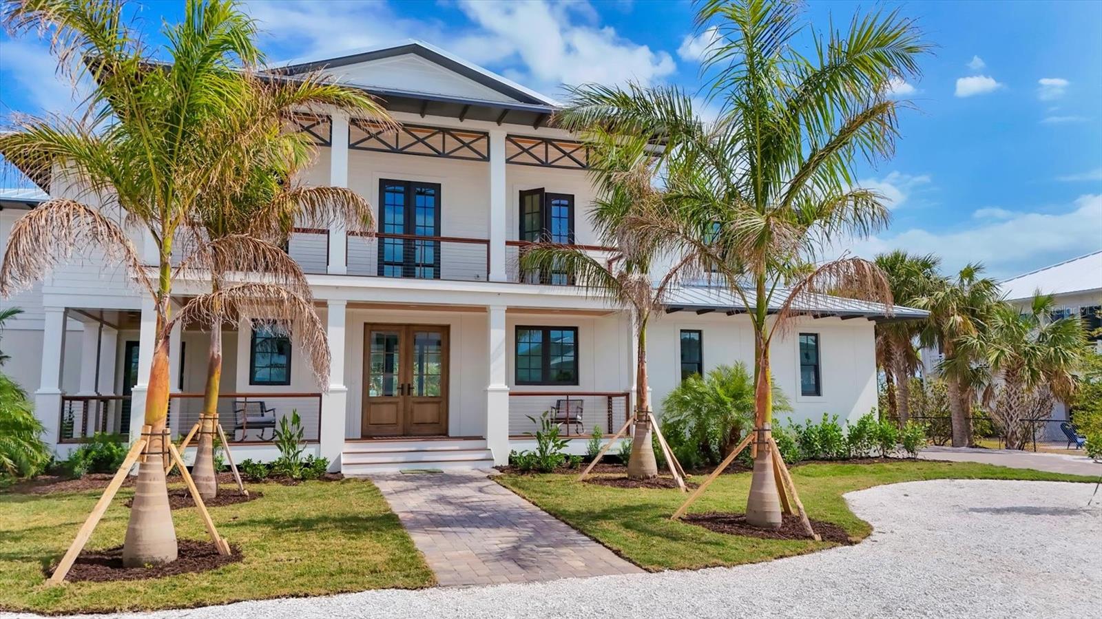 Under Construction. Welcome to the epitome of NEW luxury coastal living on the enchanting island of Boca Grande, FL. This spectacular residence delivers a harmonious blend of elegance and functionality. Boasting 4 bedrooms and 4.5 baths, this home is designed with meticulous attention to detail, offering a haven of comfort and refinement.
The kitchen, a culinary masterpiece, features top-of-the-line Thermador appliances that cater to the most discerning chef's desires. Imagine entertaining guests in a space adorned with high-end finishes, where custom cabinetry and premium countertops create a culinary sanctuary.
Experience tranquility and safety with storm impact glass and doors, ensuring your home stands resilient against the elements. Natural light floods the interiors, seamlessly integrating the lush exterior surroundings with the elegant design within.
Step outside to your private oasis, where a sparkling pool and spa beckon for relaxation under the Florida sun. Whether you're enjoying a refreshing dip or lounging poolside, the outdoor space is designed for both relaxation and entertainment.
For those who appreciate the pinnacle of convenience, an elevator graces this residence, providing effortless access to all levels. Ascend with ease to the upper floor and revel in the breathtaking views that Boca Grande has to offer.
As an added luxury, this home comes with deeded beach access, allowing you to indulge in water activities such as kayaking and paddle boarding with unparalleled ease.
This NEW CONSTRUCTION home in Boca Grande represents the pinnacle of coastal living, where high-end finishes, cutting-edge appliances, and thoughtful design converge to create a residence that is both a sanctuary and a statement.