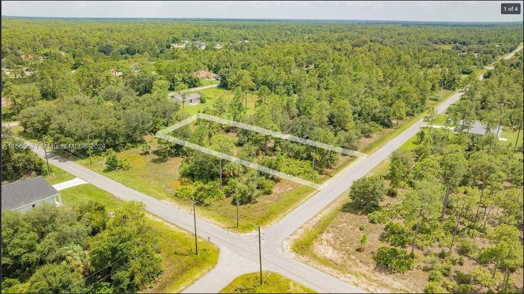 Photo of 1420 Clayton Avenue, Lehigh Acres, FL 33972 (MLS # O6343656)