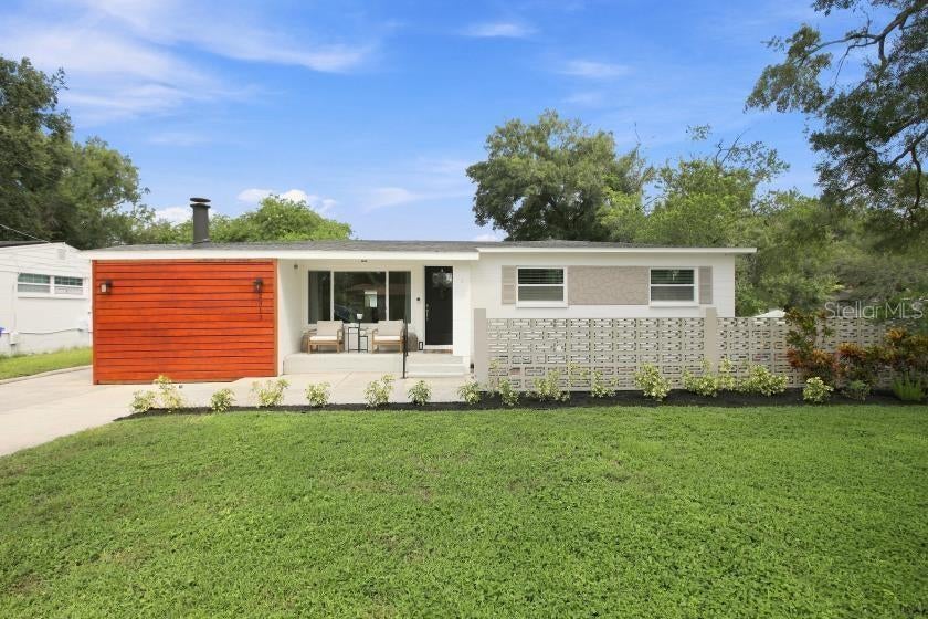Photo of 2313 Carroll Place, Tampa, FL 33612 (MLS # O6442389)