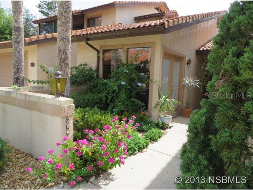 Impeccable 2 bedroom, 2 bath condo located in the coveted subdivision of Creekside condominiums set inside the prestigious Spruce Creek Fly-In community. There are only six units in this complex & it feels like a private family enclave. Make yourself at home around the private heated pool with a covered gathering area complete with Bar B-Q grill. The 2 bedrooms are both spacious with sitting areas, exterior access; master to the rear patio & guest with private entry. The open living room/dining room features a vaulted ceiling with skylights, built-in wet bar, entertainment center & wood burning fireplace flanked by sliding glass door that lead to the rear patio. The dining room has a 10' serving bar with mirror & is just off the kitchen. The kitchen has newer appliances, casual dining area, indoor laundry & French doors that open to the front entry. Spruce Creek POA fee is $1,350 annually & covers 24 hour security, maintainence on the 4000' paved & lighted runway, children's playground & Overlook Park that sits on the banks of the pristine & tranquil Spruce Creek. ;LocationDescription: Condo ;Water: City