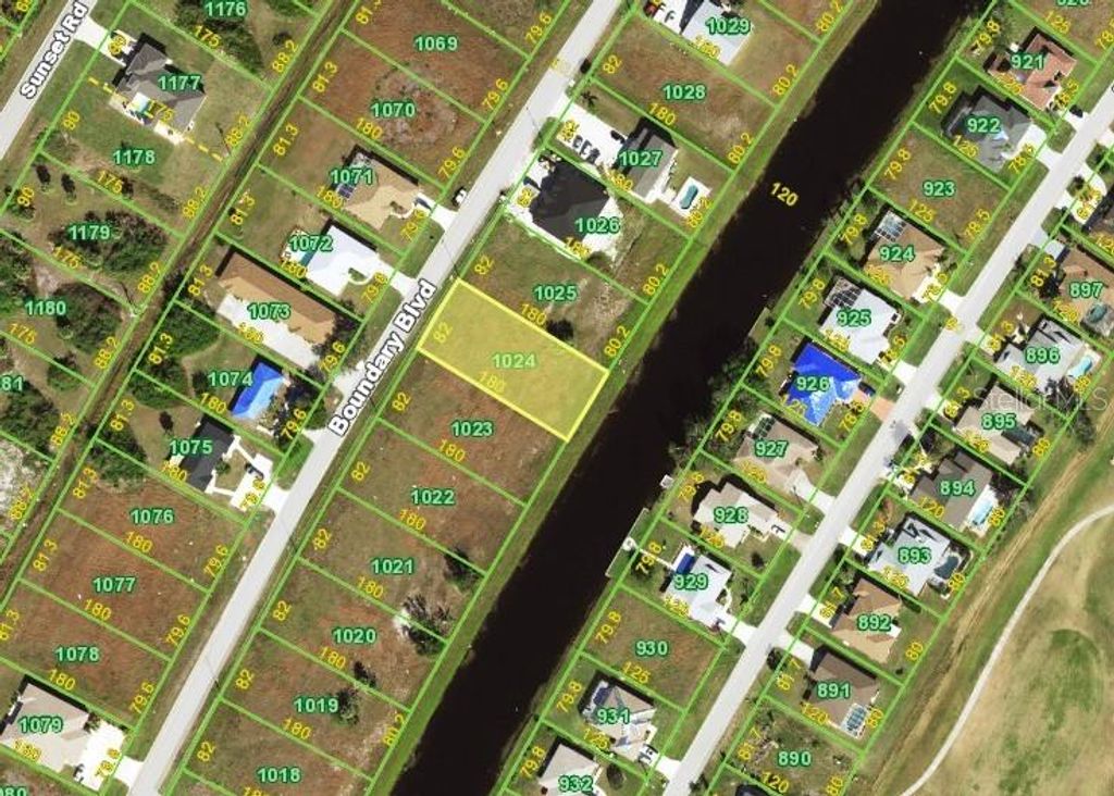 Photo of 310 Boundary Boulevard, Rotonda West, FL 33947 (MLS # D6143095)