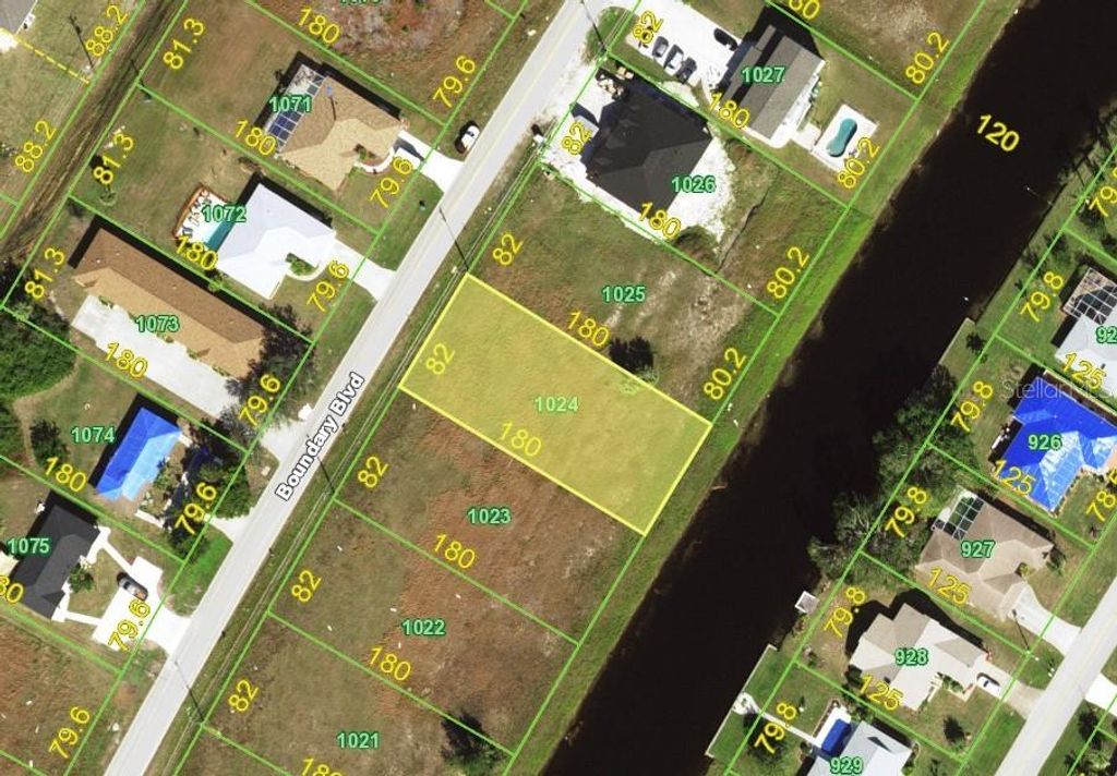 Photo of 310 Boundary Boulevard, Rotonda West, FL 33947 (MLS # D6143095)