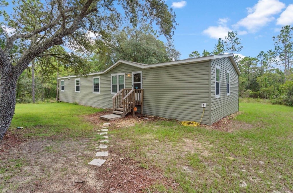 Photo of 13850 NE 52nd Place, Williston, FL 32696 (MLS # GC543506)
