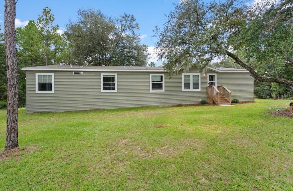 Photo of 13850 NE 52nd Place, Williston, FL 32696 (MLS # GC543506)