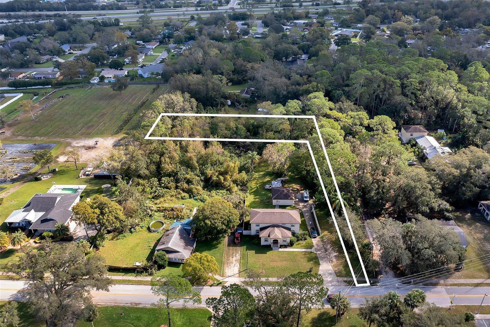 Location... Location... Location.... This land is located in minutes to everything. You can build your dream home on a secluded land with NO HOA. This land is .96 Acres with beautiful Trees and Flood Zone X. Some of the property has been cleared. You have plenty of room to park an RV or Boat. This land is minutes from an elementary school, shopping stores, a golf course, restaurants, and a hospital.