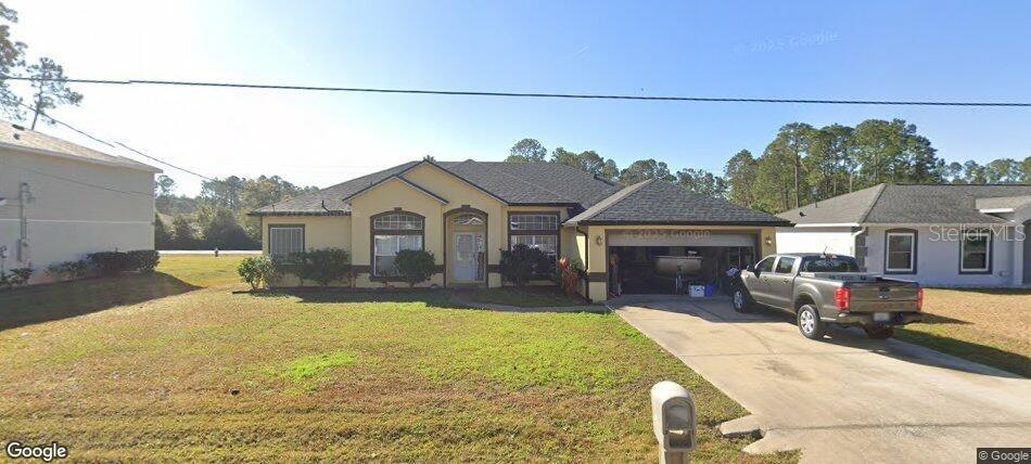 Photo of 43 Raemoor Drive, Palm Coast, FL 32164 (MLS # O6430247)