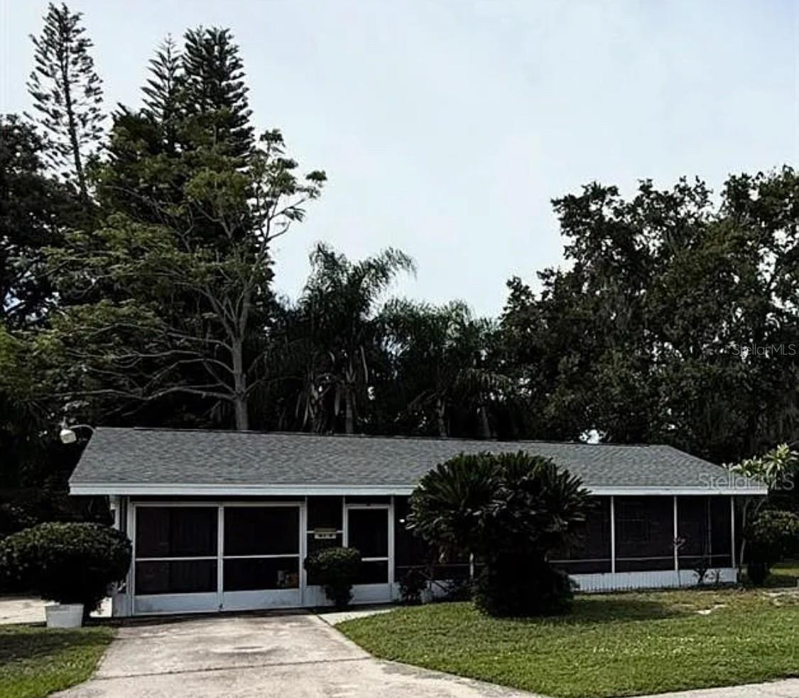 BRAND NEW ROOF 08/2025! This cozy 2 bedroom, 1 bath home offers comfort, convenience, and character in a quiet, established neighborhood. Situated on a desirable corner lot, the property features a fenced-in courtyard perfect for outdoor relaxation or pets, plus a welcoming front porch to enjoy your mornings. Additional highlights include a screened-in side area ideal for entertaining, a shed with electricity for hobbies or storage, and a separate irrigation well to keep your landscaping thriving year-round. Enjoy the unbeatable location—walking distance to Polk State College, the Polk State Sports Complex, and Lake Elbert—providing easy access to schools, recreation, and everyday conveniences! Don’t miss your chance to make this charming home yours!