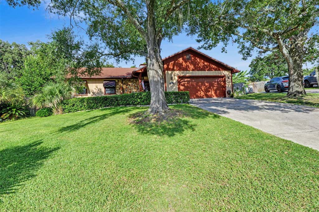 Photo of 4910 Foxrun Place, Lakeland, FL 33813 (MLS # TB8540415)