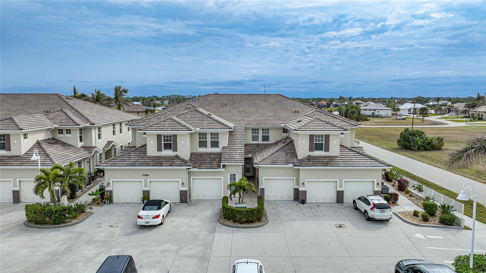 TIME TO MAKE AN APPOINTMENT TO VISIT THIS BEAUTIFUL WELL MAINTAINED 2 BEDROOM, 2 BATHROOM CONDO WITH A 1 CAR ATTACHED GARAGE. THIS IS A 1ST FLOOR END UNIT AND THESE UNITS HAVE IMPACT DOORS AND WINDOWS FOR HURRICANE PROTECTION. ALL NEW stainless-steel appliances including washer dryer were new in late 2024. Entire condo has all tile flooring, NO carpet, the kitchen features nice cabinets with granite counter tops. THIS CONDO HAS LOTS OF NATURAL LIGHT with lake views from 3 sides. On the screened porch you will be able to take advantage of the pretty warm sunrise and evening sunsets There are 2 nice sized bedrooms with a split floor plan. The master suite featuring a walk-in closet and an additional closet, dual sinks and a large walk-in shower and the 2nd bedroom is a nice size room as well. All the rooms in the unit have lots of natural light. Going to be a seasonal owner? The garage has adequate room for a Florida car and lots of storage. Roof was just replaced along with facia, soffit and down spouts. If it's needed the condo can come mostly turn-key with personal exclusions. The deed-restricted community of Burnt Store Lakes provides a variety of activities for residents. The community park includes a playground, and monthly potlucks are organized throughout the winter months. Additionally, there is a canoe/kayak launch ramp exclusive to residents, leading to Burnt Store Marina and offering direct access to Charlotte Harbor. Burnt Store Lakes boasts eleven freshwater lakes teeming with various fish species; catch and release fishing is encouraged. For wildlife enthusiasts, the area is a haven for birdwatching, including sightings of majestic Bald Eagles and their nests. The hoots of resident owls and the screech of Ospreys are common sounds in this vibrant ecosystem, which hosts an abundance of birds and wildlife. This community is located just south of the historic town of Punta Gorda, which boasts an abundance of shopping options and numerous restaurants. A short drive away lies Fisherman's Village, affectionately known as 'Fishville' by locals. Situated right on Charlotte Harbor, Fisherman's Village offers a variety of local shops and several restaurants that host live music nearly every weekend. Southwest Florida is renowned for some of the most stunning sunsets, and there's no better way to conclude your day than by enjoying a cocktail or glass of wine while watching the sunset. Just a stone's throw from Burnt Store Lakes, you'll find Burnt Store Marina, featuring two on-site restaurants, a 27-hole executive golf course, and over 500+ in-water slips, as well as stack boat storage, both indoors and outdoors. Did I mention that both the Lakes and Marina are golf cart friendly? One of my favorite sayings is, 'Come for a visit and stay for a lifetime.' You may find yourself enamored with the area and the charming city of Punta Gorda and never want to leave. Perhaps it's time to claim your own little piece of paradise. PLEASE TAKE THE TIME TO VIEW VIRTUAL TOUR OF THE HOME> ALSO IS A VIDEO OF INTERESTING DRONE SHOTS OF DOWNTOWN PUNTA GORDA.