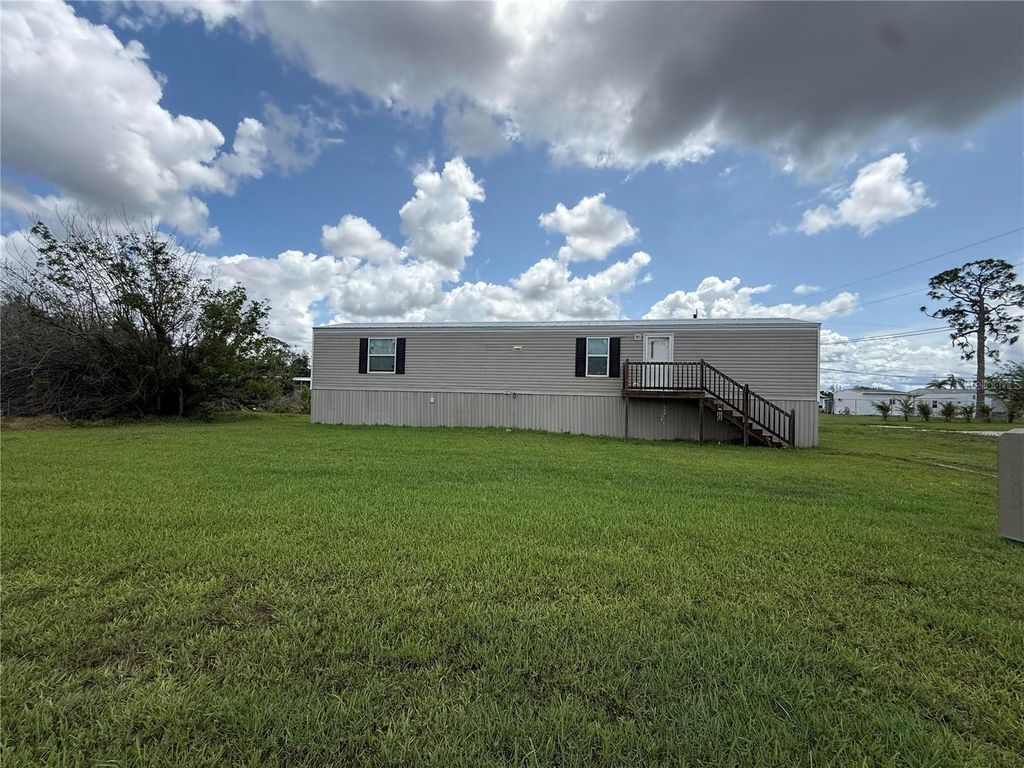 Photo of 4104 Hollis Avenue, Port Charlotte, FL 33953 (MLS # A4655040)