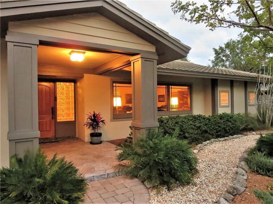 Whether you are a beach lover, water sports enthusiast or just love the island lifestyle, this home is for you! Located on a quiet section of Siesta Key, this home offers privacy, yet is not far from the excitement of island activities and Siesta Beach. Renovated with quality upgrades including High Impact windows and doors, wood and ceramic tile flooring, granite kitchen counters, wood cabinetry, stainless steel appliances, spacious master bedroom, luxurious master bath and walk-in closets. This well maintained home has a low maintenance yard and newer roof too! Open that high-impact sliding glass doors and see the inviting pool with 15-foot cage overlooking the water.  Imagine yourself  relaxing with a glass of wine or morning coffee, watching the fish and birds or simply relax in your pool and let the time go by! Siesta Village has a variety of restaurants and shops that cater to your needs. Whether you spend time on the beach, go biking, shopping, have happy-hour drinks, you will appreciate your time in paradise.