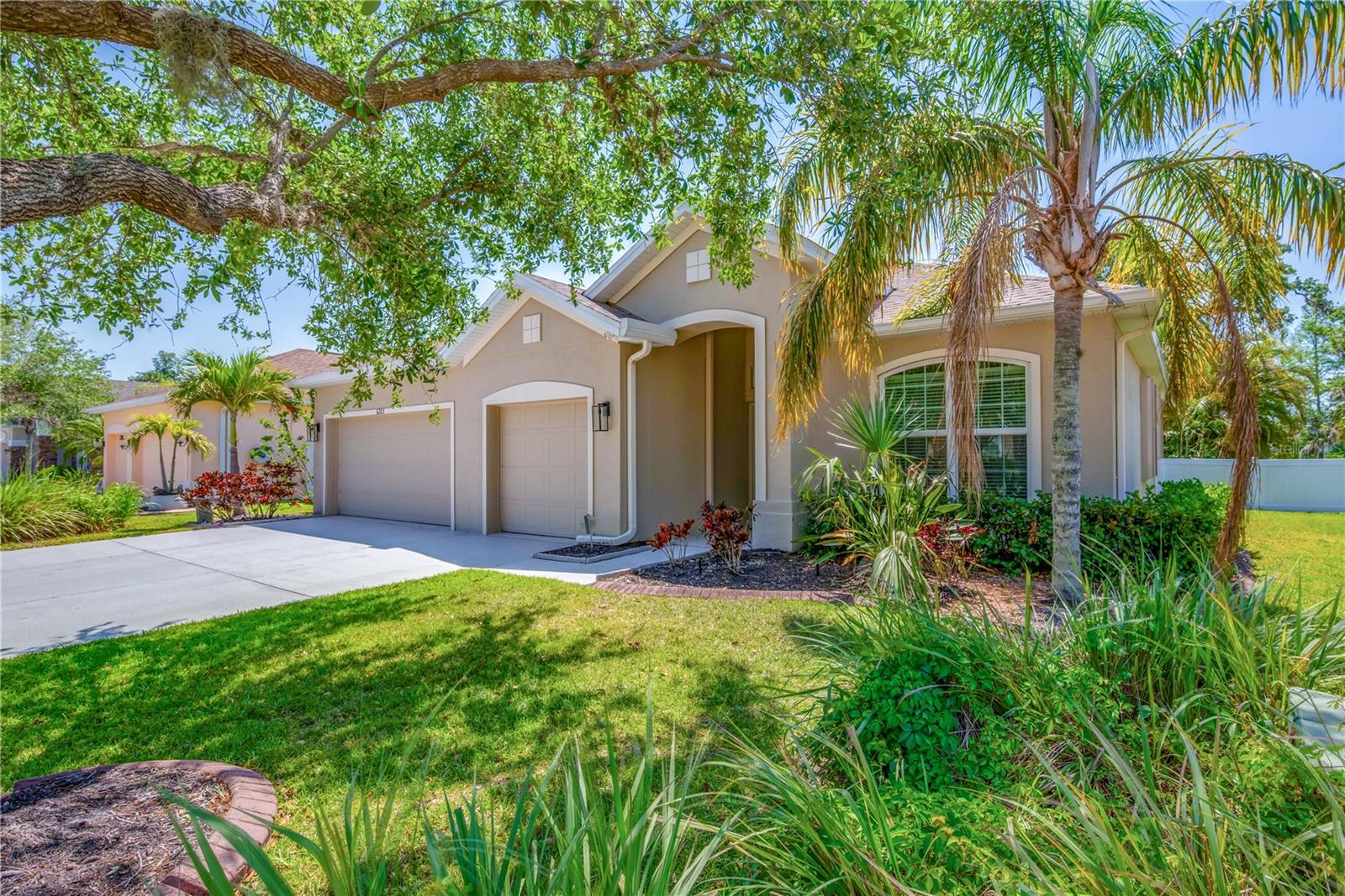 One or more photo(s) has been virtually staged. Welcome to this absolutely stunning five-bedroom, four-bathroom pool home with a 3-car garage located in the highly desirable community of Oakley Place. Spanning nearly 3,000 square feet, this is one of the largest homes in the neighborhood—and it shows. Every inch has been thoughtfully upgraded with high-end finishes and modern design touches that combine luxury and comfort. This owner has added many upgraded features such as: New roof 2022, New HVAC 2024, New water heater 2022, accordion hurricane shutters, electric roll-down storm screens on both front and rear entry with impact glass front windows, New pool pump, Ring doorbell, epoxy garage floor and driveway, and more. From the moment you step inside, you’re greeted by a warm, inviting atmosphere and a layout that perfectly balances open-concept living with private, functional spaces. The kitchen has been completely transformed with stainless-steel appliances, sleek quartz countertops, and a stylish tile backsplash. Luxury vinyl plank flooring flows throughout the home, complimented by upgraded lighting fixtures and beautiful shiplap accents that add character and charm. The main level offers four generously sized bedrooms and three full bathrooms, including a pool bath and an impressive primary suite. The primary retreat features large walk-in closets, dual quartz vanities, and a stunning open tile shower. The fourth bedroom on this level can be easily closed off with its own full bath, making it an ideal in-law suite for guests or extended family. A dedicated den or office space provides the perfect work-from-home setup. Upstairs, the upgrades continue in a massive loft area that leads to a second master suite with a private full bath. Whether used as a guest retreat, media room, or complete in-law apartment, this upper-level space adds exceptional flexibility and value. Step outside into your own private oasis. The screened-in lanai features a heated saltwater pool and spa overlooking one of the community’s serene ponds. The enclosure has been upgraded with “no-see-um” screens for added comfort, and the pool deck features beautifully upgraded pavers and tile. With color-changing LED lights and the ability to heat the pool and spa, this backyard is perfect for both day and nighttime enjoyment. Storage will never be an issue with a spacious under-stair closet and an oversized three-car garage, offering room for all your outdoor gear and toys. The location is unbeatable—just minutes from Ellenton Premium Outlets, Detwiler’s, Whiskey Joe’s, Woody’s River Roo, and a wide variety of shops and restaurants. Plus, you’re less than two miles from I-75, making trips to Anna Maria Island, Siesta Key, Tampa, St. Pete, and Orlando a breeze. This home blends style, function, and Florida lifestyle in the best way possible. Don't miss the opportunity to make it yours.