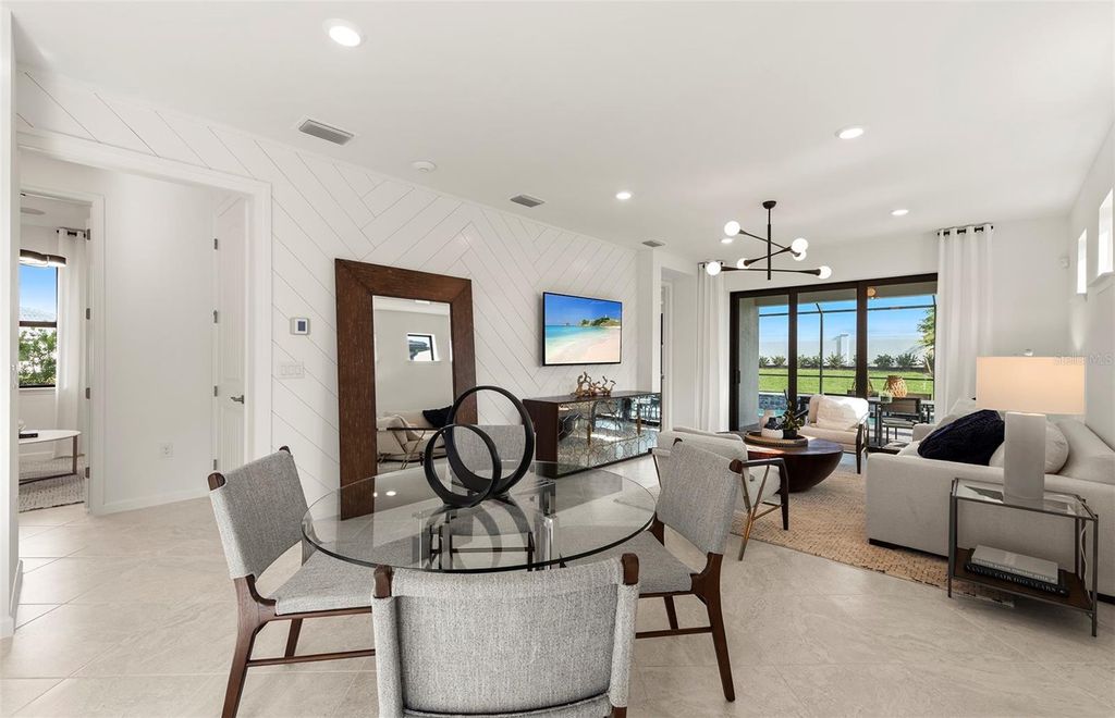 Photo of 10473 Sea Breeze Ridge, Englewood, FL 34223 (MLS # TB8507919)