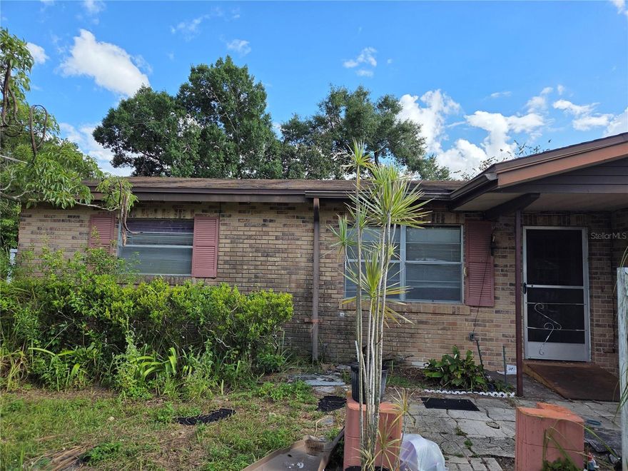 Deal fail thru due to financing!  Everything ready for new buyer, title work, inspections, call for appointment and sell!

Charming, 2/1, possibly 3, or den!  Concrete block home with mature landscaping and beautiful flowering plants.  Priced to sell,!  1/4 of and acre, fenced and ready for you to plant your garden; so pets can run around; screened porch and with storage building in rear.  Call and sell this adorable home perfect for your family.