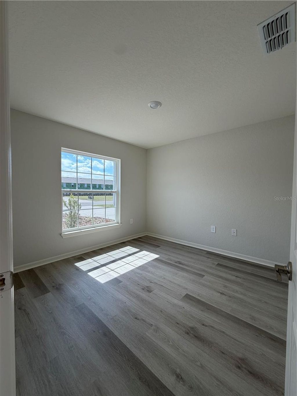 Photo of 211 Turtle Bay Avenue, Winter Haven, FL 33881 (MLS # O6386902)