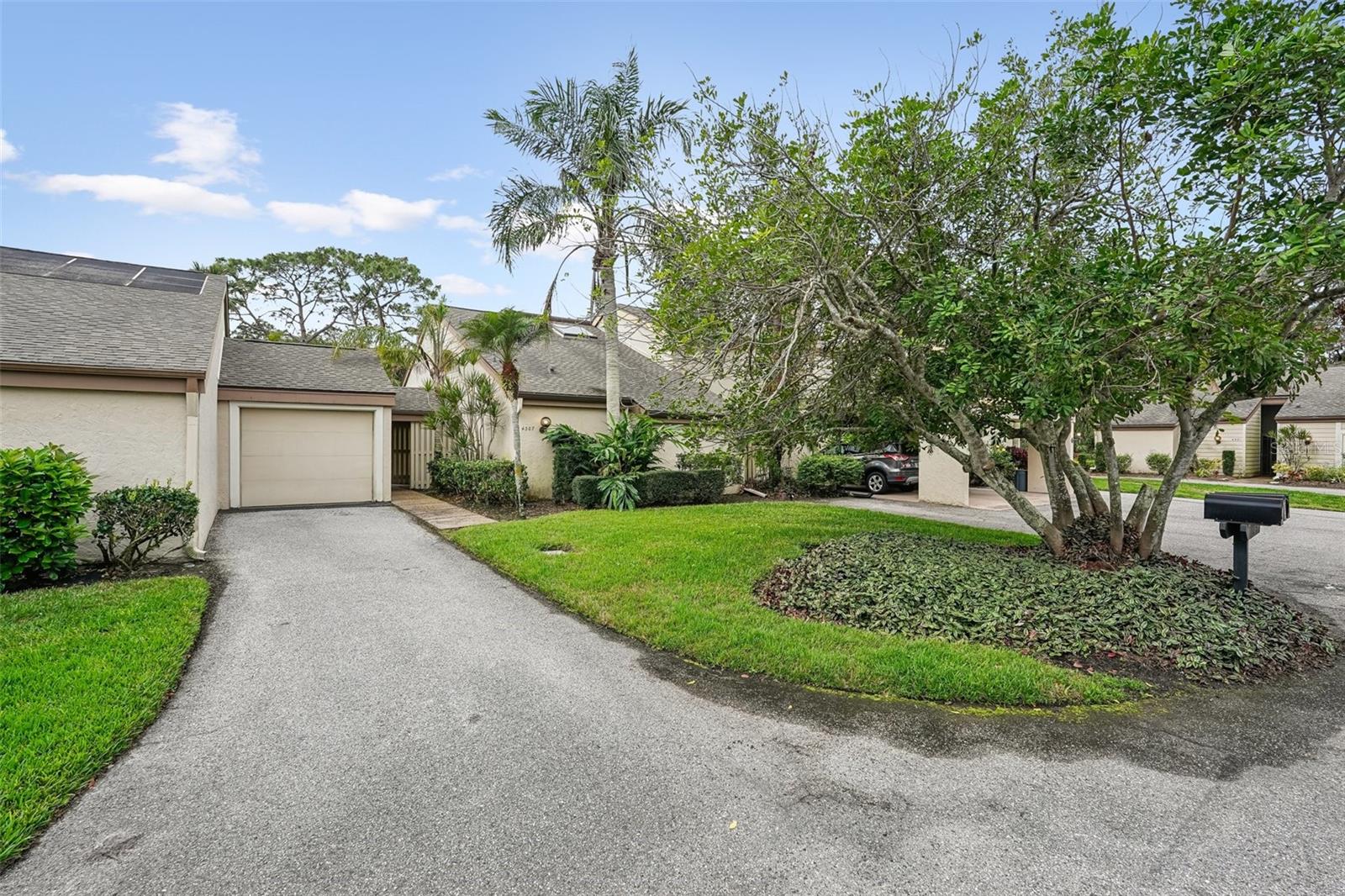 One or more photo(s) has been virtually staged. Welcome to 4307 Woodmans Chart, a beautifully updated low-maintenance villa in the highly sought-after Meadows community of Sarasota, Florida. Nestled on a tranquil cul-de-sac, this 2-bedroom, 2-bathroom home with a spacious den offers comfort, privacy, and modern upgrades in one of Sarasota’s most scenic neighborhoods. Step inside to discover luxury vinyl plank flooring, fresh paint, and a light-filled open-concept layout ideal for entertaining or relaxing. The primary suite is conveniently located on the main floor, providing easy access and a sense of privacy. The split floor plan offers privacy for the guest bedroom and bath, while the flexible den/office provides extra space for remote work or hobbies. New roof gives you ease of mind and the detached, oversized, 1-car garage offers additional storage space. Living in The Meadows means enjoying numerous community amenities. Residents have access to three 18-hole golf courses, perfect for golf enthusiasts looking to perfect their swing. Additionally, there are recreational facilities that include tennis courts, a fitness center, and multiple swimming pools, catering to a variety of interests and activities. For those who appreciate nature, the community offers scenic trails for walking and biking, winding through lush landscapes and tranquil lakes. The villa's prime location is another significant advantage. Located just minutes from UTC Mall, Downtown Sarasota, Siesta Key Beach, and I-75, this villa offers unmatched convenience and resort-style amenities in a peaceful setting. Schedule your private showing today and experience the best of Sarasota real estate in The Meadows!