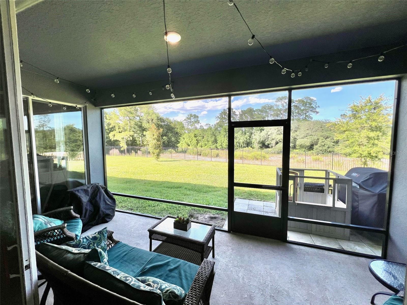 GORGEOUS Ranch-style home on more than 1/3-acre conservation lot in the award-winning guard-gated community of Providence! PRICED BELOW MARKET VALUE to sell quickly, this incredible value has 3 separate suites PLUS DEN spread over almost 2600 sq.ft. and a 3-car garage as well! Lovingly maintained since it was built in 2020, this ever-popular Monroe floor plan has it all - separate office/den with french doors, formal living and dining areas with wood-plank tile flooring throughout, large eat-in kitchen, quartz countertops everywhere, and Alexa-enabled smart home, too! Plus solar panels help reduce power bills. Don't miss your opportunity to make this one-of-a-kind homesite yours. With over 80 acres of conservation behind the 165' of fenced backyard, seeing families of deer and listening to birds makes it easy to forget you're in a planned amenity-rich community. Take advantage of the vast array of amenities the award-winning Providence Community has to offer: play 18 holes of Michael Dasher-designed Championship golf, join the tennis & pickleball leagues, swim in one of the heated pools, (Olympic-style and resort-style with slides), exercise in the state-of-the-art fitness center, or enjoy a meal in the clubhouse restaurant & bar. Also included are a dog park, playground, miles of walking and jogging trails, all behind 24-hour guarded gates, and just minutes from theme parks and all that Central Florida has to offer! With a LOW $138/mo. HOA and NO CDD FEES, it's no wonder Providence wins the Best Community Grand Award year after year! Make an appointment today to see this amazing home and community!