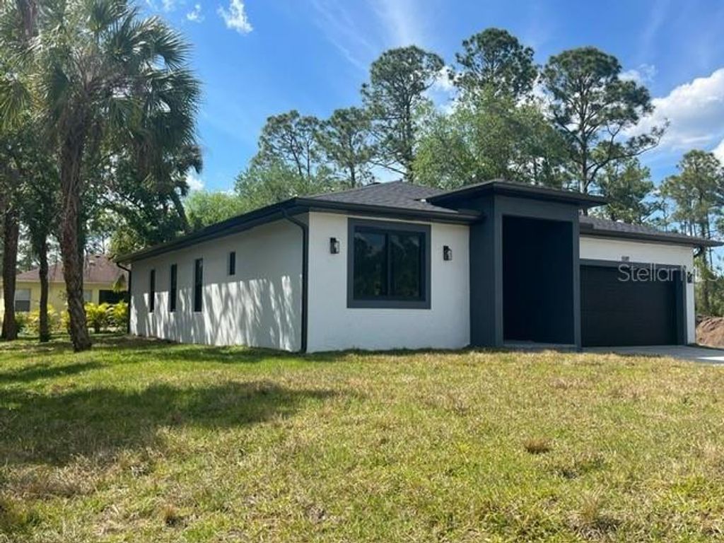 Photo of 1597 Kerman Street, North Port, FL 34288 (MLS # O6365305)