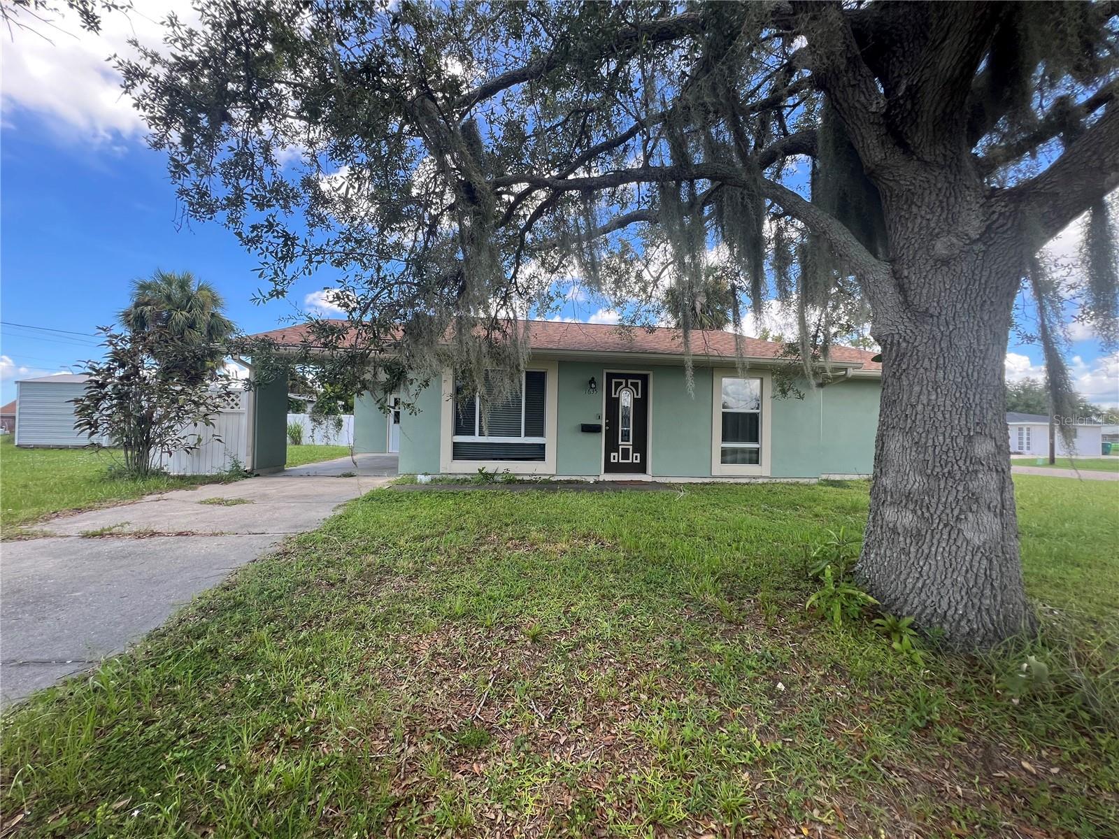 **SHORT TERM/SEASONAL** BEAUTIFUL 3/2 FURNISHED HOME AVAILABLE NOW** Updated home has kitchen has wood cabinets, GRANITE countertops, and large single stainless steel sink. Luxury vinyl plank flooring throughout the home. Spacious primary bedroom has ensuite with tiled full walk-in shower. City water and sewer. Not in a flood zone. Newer roof (2021). Walk-in laundry room with storage area. Dining room sliders lead to large undercover (12’x26’) screened lanai that has clean, attractive, easy maintenance epoxy floor. Corner lot with private fenced backyard and SCREENED in SPACIOUS PATIO. This home is perfect for entertaining guests. Located close to dining, entertainment, golf, beaches, boating waters, and baseball spring training. Call for showing today!!