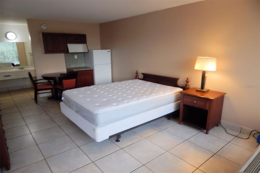 Fully furnished efficiency with refrigerator and air conditioner. Rent includes water, electricity, cable tv, trash removal and security. Conveniently located only one mile from Florida Mall, restaurants, attractions, and 6 miles to airport. No pets.