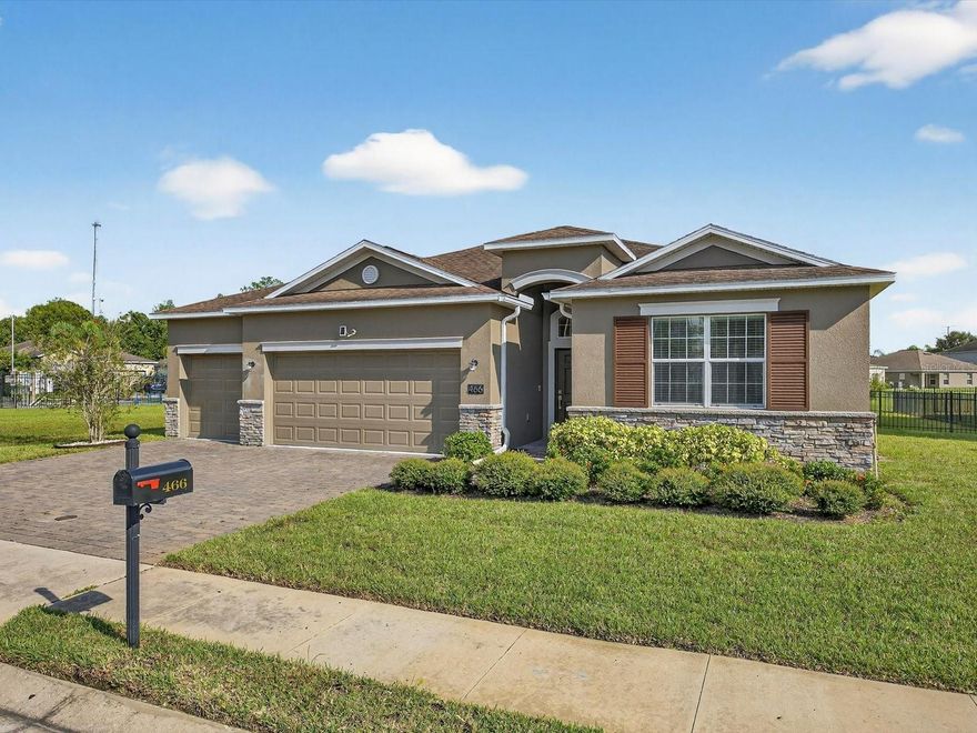 THIS HIGHLY-SOUGHT AFTER MONROE II FLOOR PLAN HAS IT ALL!! Dual Primary Suites in a 1-story home with a 3-car garage on a full-fenced corner lot with almost 1/4-acre! This open plan has all three suites on opposite ends with the living, dining, and family areas being the focal points. The open kitchen is built for entertaining with multiple seating areas, Upgraded GE Profile® slate stainless steel appliances, 42" cabinets, and an abundance of counter space finished with beautifully stain-resistant, anti-microbial quartz countertops! Enjoy all of the conveniences of Smart-Home Technology, with Ruckus wi-fi, Alexa-enabled Lutron switches, and even control your Thermostat, garage doors, and door locks remotely, all with the ease of up to 5GBPS of fiber-optic internet. The Owners' Suite provides a welcome retreat, with high ceilings, sliding-glass doors to the lanai, his and hers closets, dual vanities, and a large walk-in shower and soaking tub. Once again, this home has a true 3-car garage so you can park your cars AND still have room for your golf cart! Yes, you can drive your golf cart around the Community to swim in one of your 2 heated pools, to work out in your state-of-the-art fitness center, or to enjoy a nice meal at the restaurant! (And of course, to get to the Michael Dasher-designed Championship golf course, or brush up on your swing with a bucket of balls at the Golf Academy!) All of this in the award-winning Community of Providence with 24-HOUR GUARDED SECURITY, lighted tennis and pickleball courts, fitness center, playground, heated olympic-style pool and resort-style pool with waterslides, and so much more! With low HOA and no CDD fees, and tons of amenities, it's no surprise Providence has won Best Community awards year after year. AND... ask how you can SAVE THOUSANDS with the fully assumable 2.625 rate mortgage!!! Not only is the location hard to beat, the spacious layout and incredible finance option make this home truly one-of-a-kind! Book an appointment today to make this home yours!