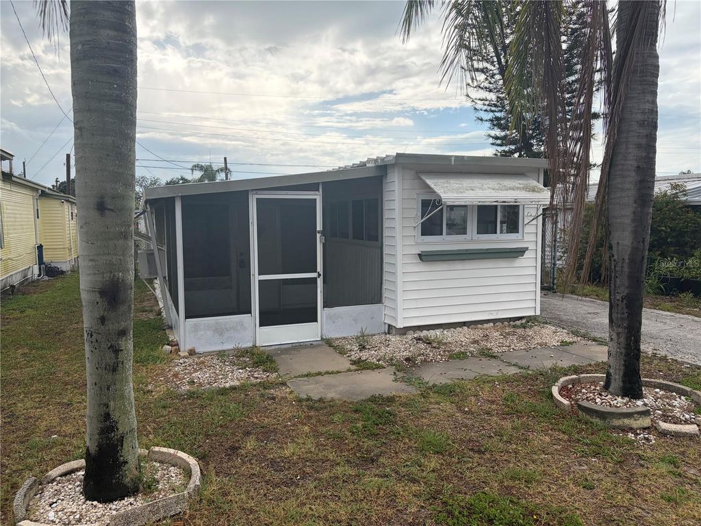 Photo of 2051 Orange Drive, Holiday, FL 34691 (MLS # TB8508255)
