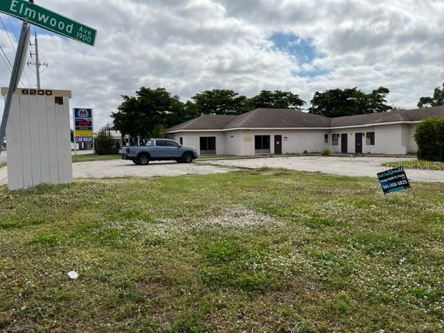 This is a rare opportunity to find a corner commercial property within a short distance from the South access to Siesta Key. This property is located just North of Benderson's development known as Siesta Promenade. The front property located at 6200 S Tamiami Trail is zoned CG and the vacant lot behind it is 6207 Brentwood is zoned RMF1. Both properties together are 33,087 SF. Present owner had planned on turning the property into a restaurant. Have a complete set of working drawings for the restaurant. A survey is available for both properties.