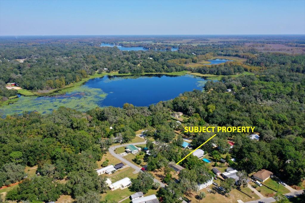 Welcome to this delightful, BRAND NEW, never lived in, Champion Year 2022 on a spacious .31-acre lot. The Duval Island Drive Public Boat Ramp is only 5 minutes away from your property. Bring your boat and RV, the long driveway has plenty of room! Installed in 2024, Certificate of Occupancy received on 4/18/2024 - NEW 900-gallon SEPTIC/ 250 SF FIELD, NEW ELECTRIC, NEW AC. NO HOA! NO Lot Lease Fees! The home is conveniently located on a quiet street and connected to PUBLIC WATER. Septic final inspection and site plan available.
Discover an inviting interior space featuring an open floor plan, stylish finishes, and ample natural light, creating a welcoming atmosphere for everyday living and entertaining. Enjoy the serenity of rural living without sacrificing convenience, as this property offers a peaceful retreat while still being within easy reach of nearby amenities and attractions. Floral City is often referred to as “Old Florida.” Its moss-draped tree canopy along The Avenue of the Oaks and historic homes evoke a sense of the early 20th century. Withlacoochee State Trail: Floral City is located at the 23-mile marker of the Withlacoochee State Trail, Florida’s longest paved recreation trail. Cyclists and nature enthusiasts explore this scenic trail, which follows an old railroad line and spans 46 miles. Minutes away from the Floral City Chain of Lakes, the Sleepy Hollow Fish Camp, or the Withlacoochee River. Embrace the tranquility of rural living while enjoying the modern comforts of a brand-new home!