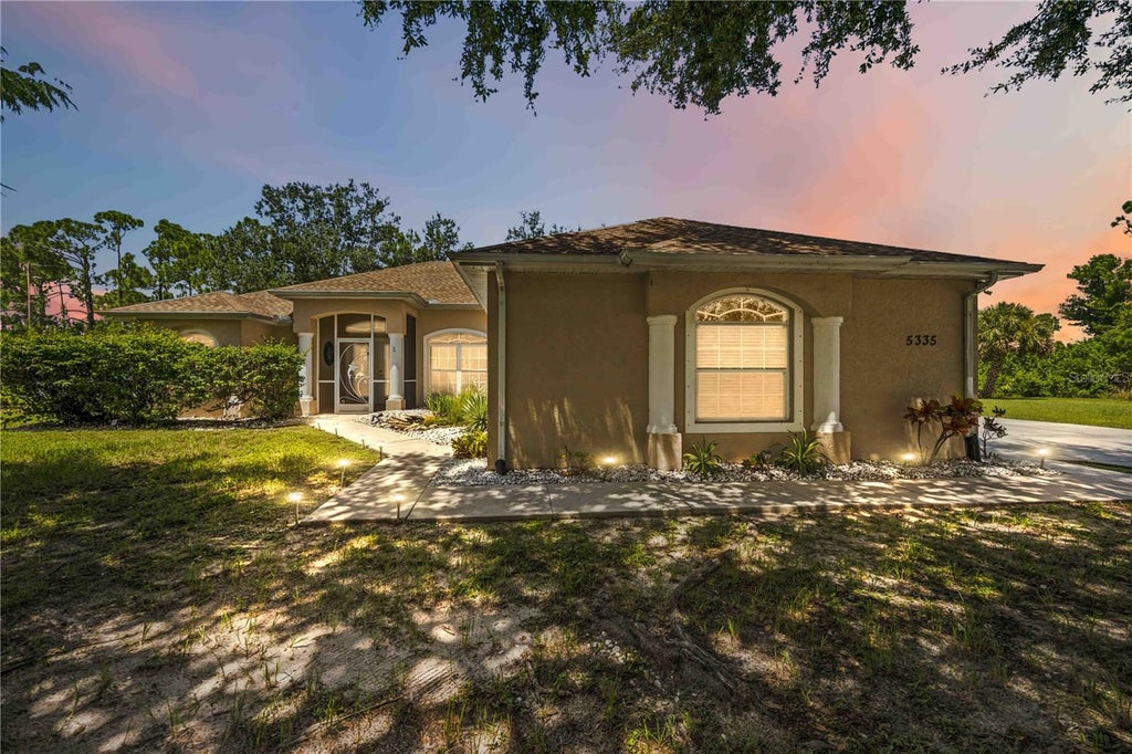 Photo of 5335 Bryan Terrace, Port Charlotte, FL 33981 (MLS # D6148632)