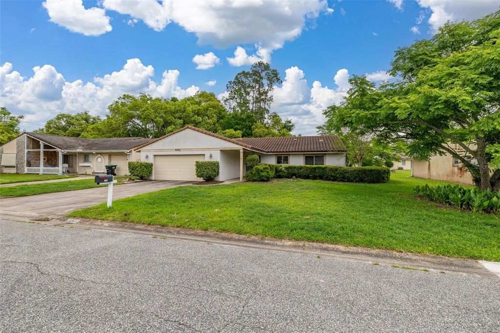 Photo of 10702 William Tell Drive, Orlando, FL 32821 (MLS # O6398655)