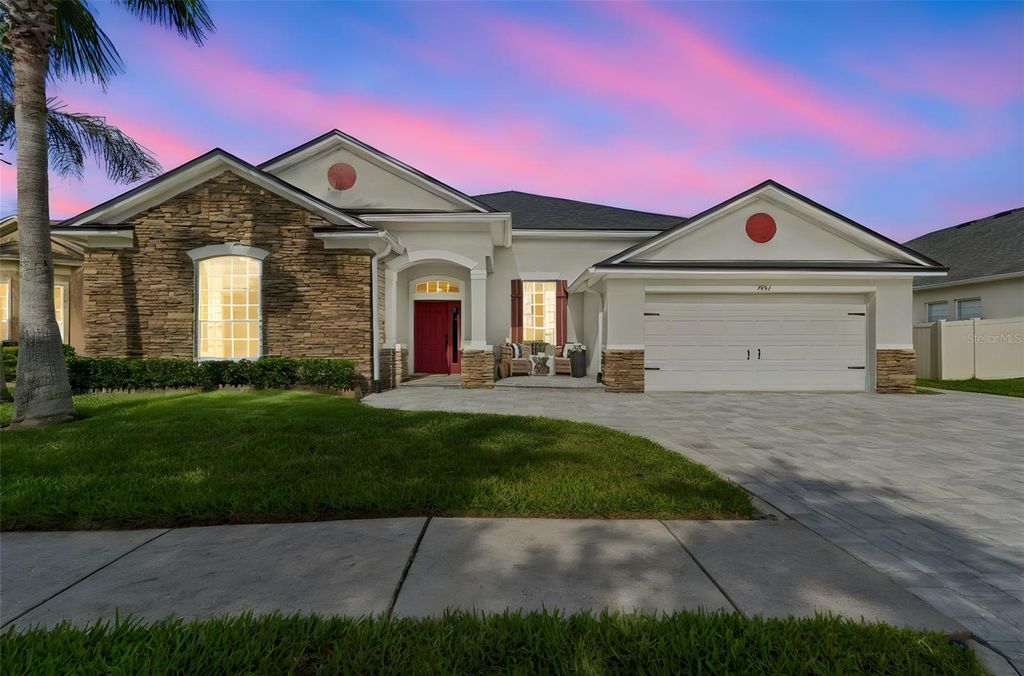Photo of 7441 Ambleside Drive, Land O Lakes, FL 34637 (MLS # TB8497943)