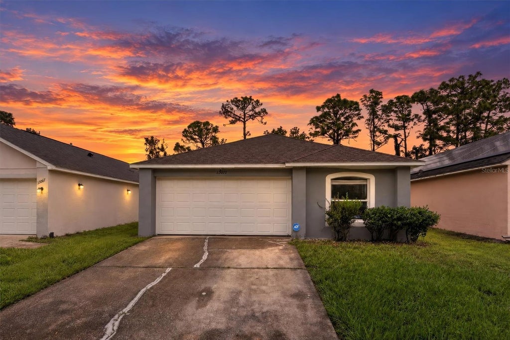 Photo of 13071 Odyssey Lake Way, Orlando, FL 32826 (MLS # O6444924)