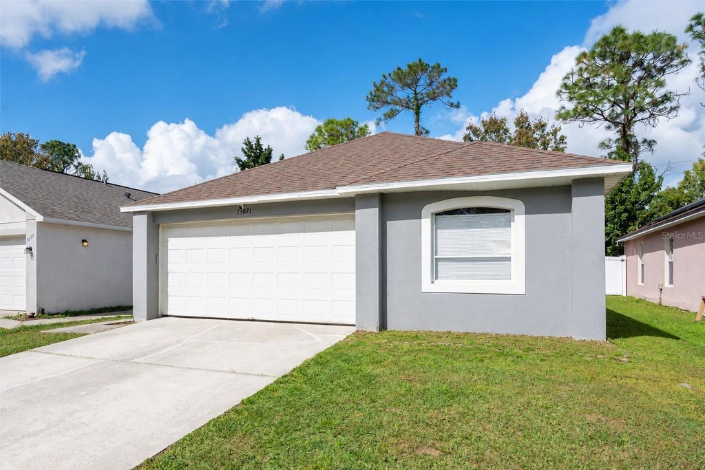 Photo of 13071 Odyssey Lake Way, Orlando, FL 32826 (MLS # O6444924)