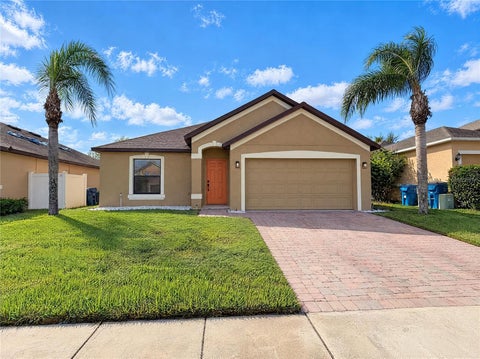 Photo of 532 Savannah Preserve Loop, Davenport, FL 33837 (MLS # O6451606)