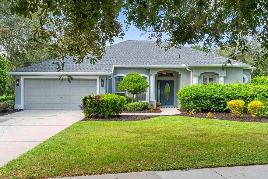 Welcome to this beautifully upgraded home located in the highly desirable gated community of Creekside. Set on an oversized lot in a stunning neighborhood, this spacious residence offers incredible value with the savings of well and septic utilities. Recent upgrades include a brand-new roof, updated saltwater pool system, refreshed landscaping, a 2023 water heater, and a newly replaced septic drain field. The natural gas range and hot water heater, along with a water softener system, add to the home's efficiency and comfort.
The backyard is truly a private oasis, featuring a gorgeous saltwater pool with a custom one-of-a-kind finish, a sunning ledge, and a breathtaking slate waterfall. The covered lanai provides ample space for entertaining, and the paver-stone pool deck adds both elegance and functionality. The large, fenced backyard backs up to a serene conservation area, providing privacy and peaceful views with no rear neighbors. Inside, the home features a spacious open floor plan with cathedral ceilings, plantation shutters, and beautiful laminate flooring throughout the main living areas. The recently remodeled kitchen opens into a large great room, while a formal living room and dining room with additional space for gatherings. The split-bedroom layout features three bedrooms on one side of the home and a large master suite with an en-suite bath on the other, providing ideal privacy for families or guests. An extra-long driveway makes hosting a breeze, and the home is located in a top-rated school zone. Creekside is known for its beautiful estate homes on half to one-acre lots and offers the perfect blend of privacy and convenience. Just minutes from I-75, Tampa International Airport, shopping, dining, and entertainment, this home combines luxury, comfort, and location all in one. Don’t miss your opportunity to live in one of the area’s most sought-after communities. This home is truly a must-see.