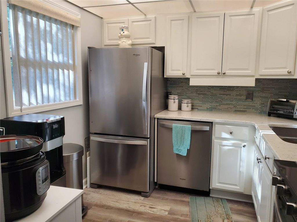 Photo of 11485 Oakhurst Road #1200-216, Largo, FL 33774 (MLS # TB8457361)