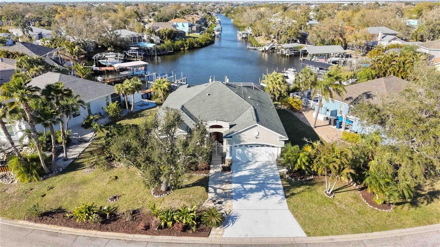 Your Florida waterfront lifestyle is waiting! This beautiful pool home offers direct access to the Manatee River.  No community lifts or bridges here— a true boater’s dream!  With nearly 2000 square feet of living space and former model home, this three-bedroom, two-bath residence features a desirable split floorplan and high ceilings throughout.  Enjoy the open, airy feel that the large windows and sliders provide inviting in natural light and showcasing the waterfront setting.
The spacious kitchen is perfect for entertaining, complete with granite countertops, under cabinet lighting, closet pantry, and plenty of cabinetry for storage. It flows seamlessly into the main living areas, making gatherings effortless and enjoyable.  The primary bedroom is large enough to accommodate a variety of furniture suites and you'll love the French doors that offer access to the pool area.   The en suite bathroom has dual sinks, garden tub, a walk-in shower, and dual closets — including one walk-in. The additional bedrooms are thoughtfully positioned on the other side of the home for added privacy and include additional large storage areas above the built in closets.

Step outside to your private backyard featuring a sparkling pool and relaxing spa overlooking the canal. Boating enthusiasts will love the 9,000 lb boat lift (operational by remote), and access to both water and electric on the expansive dock.  The fish cleaning station lets you prep the day’s catch immediately and conveniently, keeping mess outside while maximizing your time enjoying the water.  Set at the top of a quiet, circular canal, the home offers the ultimate boating convenience with a direct, no-angle approach to the boat lift—so coming home by water is as easy as pulling into your driveway.  Additionally, the community's private boat ramp is nearby for your initial launch.  

The brand-new water heater and newer roof provides peace of mind, and this home has remained high and dry through recent storm seasons.  This home is ideally located just minutes from shopping, dining, and convenient access to Interstate 75.

If you’ve been searching for the true boating lifestyle with all the perks — this is it!