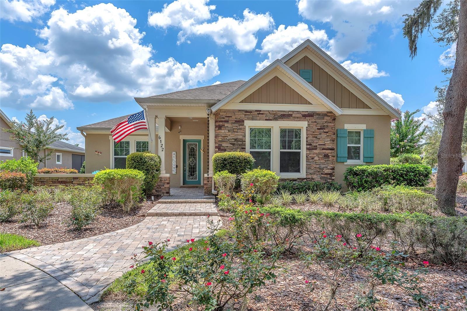 Welcome to this spectacular home located in the gated community of Encore at Fishhawk Ranch. Encore is one of Tampa Bay’s premier communities which was designed for 55+ residents. This home, located across the street from Lake Hutto has a beautiful, unobstructed view with stunning sunsets and a walking trail. You will enjoy those views from your covered porch. Nestled on one of the largest lots in Encore, the owners spared no expense as they surrounded the home with lush, Florida Friendly Landscaping. As you step inside the home it features an open-concept floorplan with over $140,000 upgrades. The kitchen features a gas cooktop, wall oven with microwave, upgraded quartz countertops and backsplash, 42-inch painted wood cabinets with crown molding, a large single stainless-steel sink with accessories, and a large kitchen Island which overlooks the family room. There are 2 additional bonus areas for formal living or office, fitness, or crafts….you decide. Upgraded tile in the home promotes easy care. No luxury was spared in the large Owners Suite with crown molding and a tray ceiling. The Master Bath has dual sinks with marble countertops, framed mirrors, extra storage, separate walk-in shower, tub with decorative tile surround, water closet and a very large master closet. The second bedroom has an ensuite with marble countertops and a view of Lake Hutto. The screened, paved lanai with a sparkling pool is the perfect place to entertain family, friends, and neighbors. The pool has a waterfall feature, lighting and 8 jets with a seating ledge. The three-car garage is in the back and provides plenty of storage as well as 3 parking spaces. The driveway is beautifully constructed with pavers. The home includes water softener, surround sound and security system. Encore offers a full-time Lifestyle Team which plans and organizes community events for your pleasure. The HOA fees cover yard maintenance, cable and high-speed internet. The Oasis Club, Encore’s state-of-the-art clubhouse, offers a resort style heated infinity pool, spa, pickle ball, bocce ball courts, grill stations, outdoor TVs a fitness center, card rooms and much more. Owners in Encore have access to all the amenities in Fishhawk Ranch West including the Lake House, community pool, fitness center and recreational facilities. This could be your forever home! Call today for a private showing.