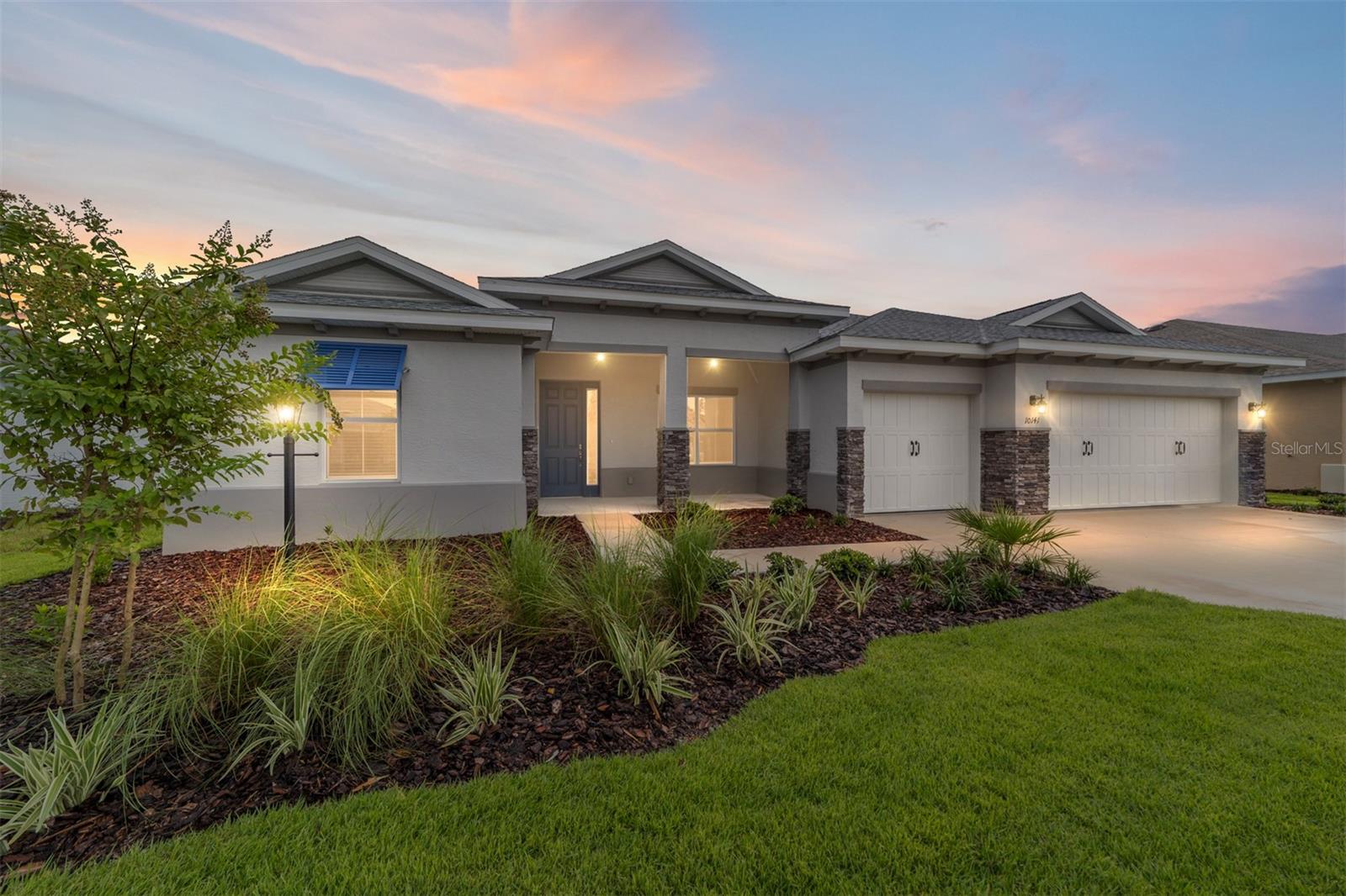 Welcome to the Beatrix model in the sought-after LongLeaf Ridge neighborhood of On Top of the World—Ocala’s premier 55+ active adult community. This brand-new home blends modern design with thoughtful details to create a perfect retreat. Inside, the open-concept floorplan features a bright great room and a stunning kitchen with staggered cabinets crowned with molding, stainless steel appliances, under-cabinet lighting, an oversized island, and a spacious pantry. Just off the main living area is a versatile flex room with French doors and a closet, ideal for a home office, den, or guest space. The owner’s suite is a true highlight, complete with a 3-panel window overlooking the backyard, a generous walk-in closet, and a spa-like en suite bath. The bathroom includes a double vanity with quartz countertop, zero-entry tiled shower with bench, and a linen closet. For added convenience, the laundry room connects directly to the master closet. The guest bedroom includes a closet and window with blinds and is conveniently located next to the guest bath, which features a single vanity with quartz countertop and a tiled tub/shower combination. Step outside to enjoy your covered lanai—perfect for morning coffee or evening relaxation. Built with energy-efficient construction and today’s most desirable finishes, this home offers both comfort and style. Living in On Top of the World means access to world-class amenities, including golf courses, resort-style pools, fitness centers, pickleball, tennis, and countless clubs and activities—all within a golf cart-friendly community. Don’t miss your chance to own this beautiful new construction home in LongLeaf Ridge!