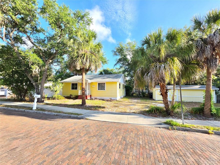 One or more photo(s) has been virtually staged. Walkable Safety Harbor cottage just .3 miles from town center, offering character, comfort, and recent updates. Inside, the home features beautiful real wood floors, plantation shutters, custom built-in bookshelves, and warm wood accents that create an inviting and timeless living space. The kitchen open kitchen and dining room combo makes everyday living and entertaining comfortable and functional. Both bedrooms feature wood flooring and plenty of natural light, providing cozy and flexible spaces for rest, work, or guests. The updated bathroom includes new tile, a new vanity, updated fixtures, and a refreshed shower/tub stall for a clean and contemporary feel. Important system upgrades add peace of mind, including a 2022 Trane A/C, tankless water heater, newer electrical panel, and new front and back doors installed in 2024. Outside, enjoy a fully fenced backyard perfect for pets, gardening, or relaxing outdoors. The property also features a storage shed, extra off-street parking, and a convenient rear access ramp. Located less than half mile to walkable downtown Safety Harbor and the waterfront, residents enjoy easy access to parks, a marina, local restaurants, boutique shops, year-round festivals, and the famous Safety Harbor Resort and Spa. Experience the charm and relaxed coastal lifestyle that make Safety Harbor one of Tampa Bay’s most sought-after communities.