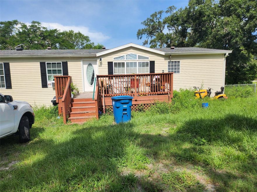 Escape to the country with this spacious 4-bedroom, 2-bathroom home nestled on 1 peaceful acre in Dade City. Offering over 2,100 sq. ft.
of living space, this property is full of potential and ready for your personal touch. Listed AS IS, it's a rare find with no HOA and no deed restrictions—bring your animals, toys, or build your dream workshop. Inside, you'll find a generous floor plan with split bedrooms, a large kitchen, and multiple living areas perfect for a growing family or multigenerational living. The land offers plenty of space for gardening, animals, or simply enjoying the quiet, rural surroundings. 

Enjoy the best of both worlds—peaceful country living just under an hour from Tampa and 90 minutes to Orlando, making it an ideal location for commuters or weekend getaways. Whether you're looking for your next homestead, an investment opportunity, or a peaceful retreat, this property is worth a look. Don't miss your chance to own a slice of Florida freedom—schedule your showing today!
