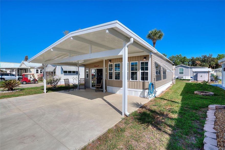 Beautiful "MOVE IN READY" "FURNISHED" home located in the Citrus ridge 55+ community in Davenport. This beautiful and meticulously maintained home is ready for it new owner!!! Fabulous floor plan and built for efficiency.  Relax in the large approximately 300 square ft.  family room. The exterior of this home offers double pane windows, a carport, with a large driveway that will allow for 4 car parking. Enjoy the evenings or breakfast in the morning on the brick paver patio. Need storage? this home has a BIG shed included.  The A/C has been updated and has a newer instant hot efficient water heater.  The Citrus Ridge offers many amenities such as a clubhouse, pool, pickleball, shuffle ball, BBQ area, and fitness center. Very Low HOA dues and NO CDD!! Citrus Ridge is located approx. 1.5 miles from I-4 just off Hwy #27 in Davenport. Medical facilities, Hospital, restaurants, major shopping, grocery stores are located within 2 miles of this community, Sam's Club and Walmart are under construction just out side this community. Best of all the owner of this beautiful home owns the land!! NO lot rent.