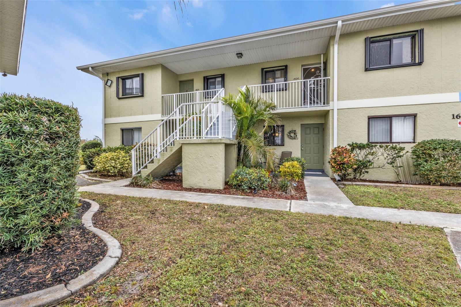 Imagine yourself living in this charming 2nd-floor condo in the highly sought-after Deep Creek community of Punta Gorda, FL! An open floor plan with 2 spacious bedrooms and 2 full bathrooms. Kitchen features a convenient bar area, glass top Stove with Over the Hood Microwave, dishwasher, refrigerator, and plenty of cabinet space. Washer/Dryer located in the laundry closet. Lanai is screened in to enjoy your morning coffee or watch the evening sunsets where you can relax and take in the serene lake views. Hurricane shutter protection provides peace of mind for all weather conditions. Enjoy swimming in the community pool. It also comes with a dedicated parking spot located right in front of the condo. This condo is located minutes from shopping, restaurants, and medical facilities. Only a 10–15-minute drive to all of what Punta Gorda has to offer including, Fisherman's Village, Punta Gorda airport, waterfront restaurants, and historic downtown Punta Gorda.