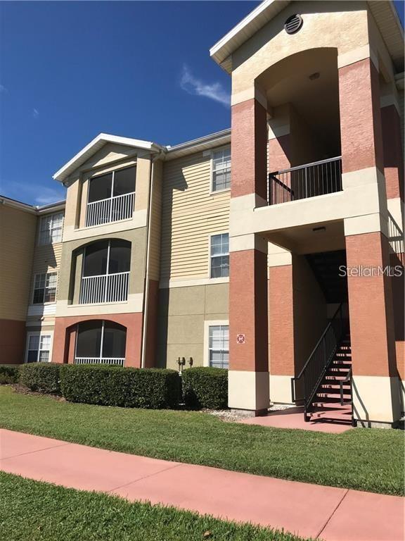 Lakeside Condo Living! WATERVIEW and 1st. floor condo in Oviedo's Villas at Lakeside. Enjoy views of the water from living area and bedrooms. 1st. floor unit situated in one of the most secluded buildings in the community. Super private and Quiet! Large covered and screened in patio overlooks the pond as well and comes with a storage closet. This unit has been upgraded, tile throughout, remodeled bathrooms with granite, newer tile and walk in showers. Open floor plan is large enough for dining room table and plenty of living room furniture. Two Master bedrooms, featuring walk in closets, sit on each side of the condo. Villas at Lakeside features a community pool, playground, park, and clubhouse